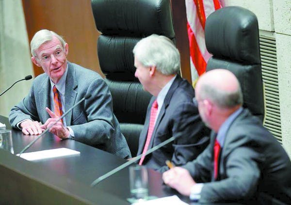 JUDICIAL DISCUSSION: Judges William C. Canby Jr., Richard Clifton and Michael Daly Hawkins, of the U.S. Court of Appeals for the Ninth Circuit, address an audience in the Great Hall of Armstrong Hall at the Sandra Day O’Connor College of Law following oral arguments on Tuesday. A panel of the federal court annually visits the Great Hall, giving students, faculty, staff, alumni and the general public an opportunity to listen to oral arguments in real cases. (Photo courtesy of David Sanders)
