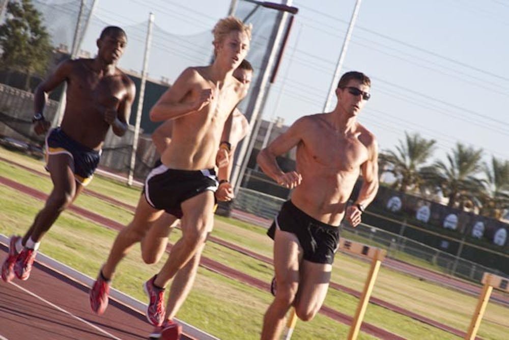 EXTRA MILE: The ASU men's cross country team trains during practice Tuesday morning. The team will travel to Tucson this weekend for the Dave Murray Invitational. (Photo by Annie Wechter)