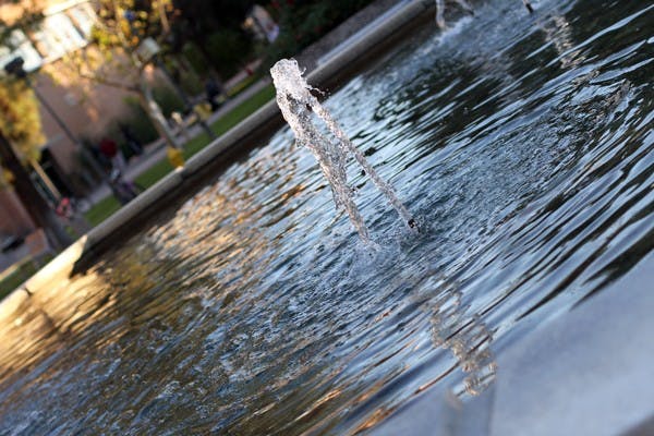 The Memorial Union fountain splashes during sunset Monday on the Tempe campus. (Photo by Lisa Bartoli)
