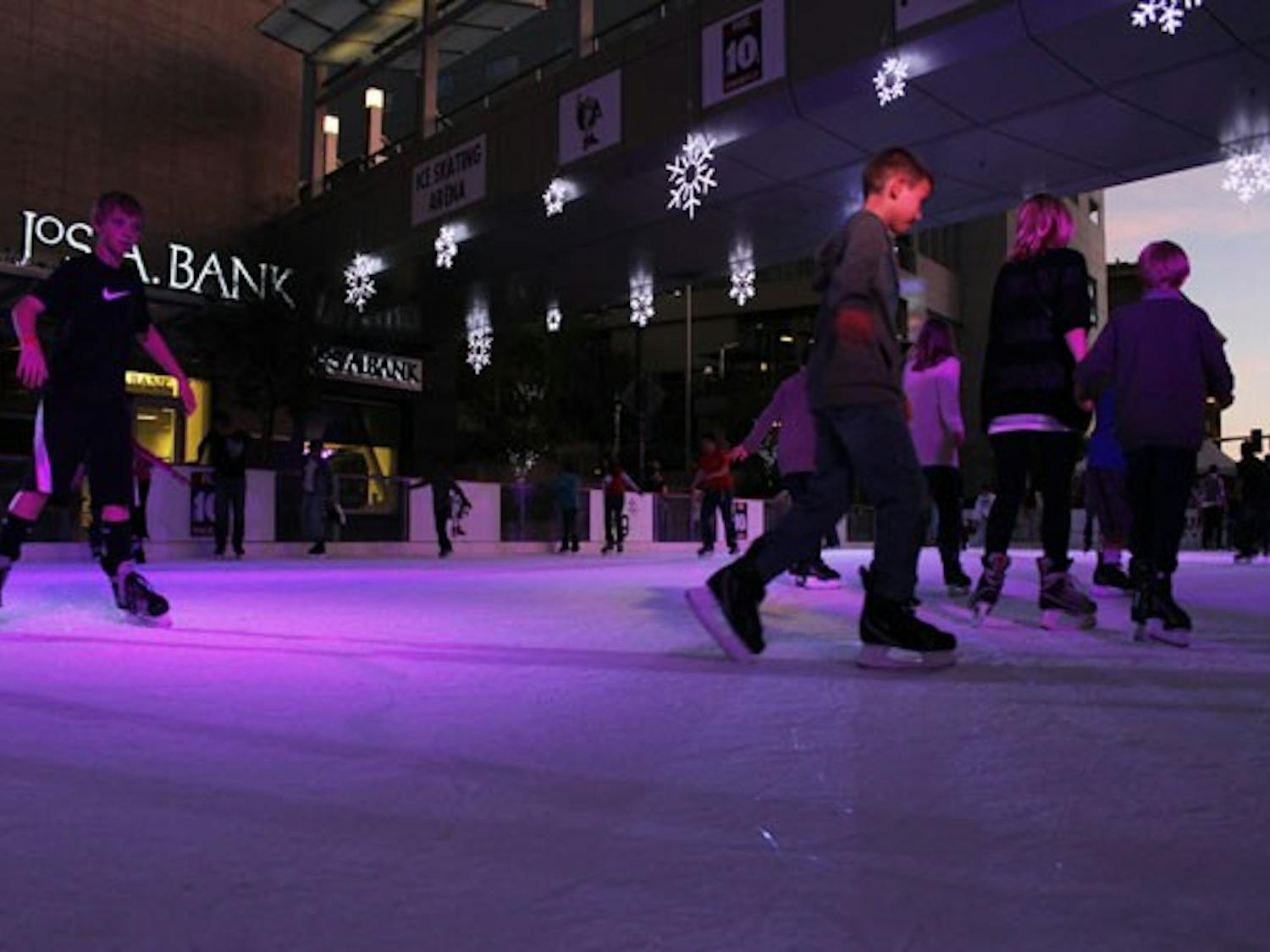 NRG hosts CitySkate, a set-up holiday ice rink, at Cityscape in downtown Phoenix. Friends, couples and families enjoy the temporary outdoor rink to the sound of holiday music. (Photo by Ana Ramirez)