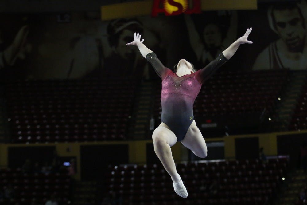 ASU junior Nichelle Christopherson performs on the beam in a gymnastics meet against UCLA at Wells Fargo Arena in Tempe, Ariz. on Saturday Feb. 4, 2017.  