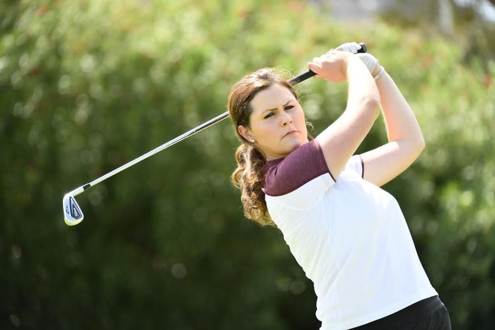 Olivia Mehaffey is pictured practicing her swing.&nbsp;