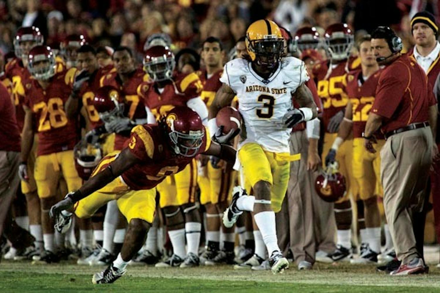 BOLD PLAY: Redshirt junior cornerback Omar Bolden runs an interception back for a touchdown against Southern California last Saturday. Bolden will play a key role in the secondary this week as it tries to stop Stanford's electric passer, redshirt sophomore Andrew Luck. (Photo by Scott Stuk)