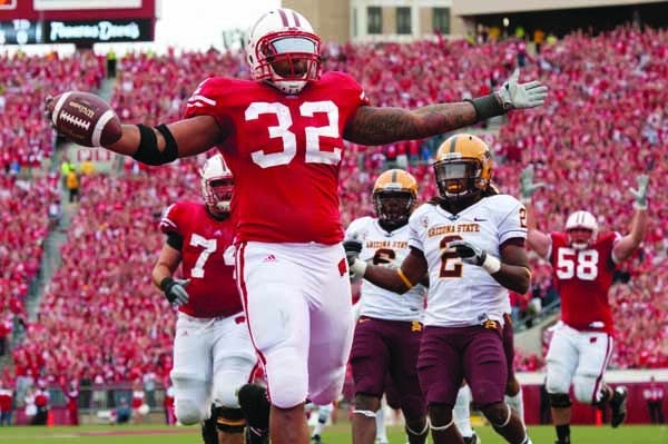 GAME-WINNER: Wisconsin junior running back John Clay runs in a touchdown during Saturday's game in Madison. The touchdown proved to be the game-winner and Clay finished with 125 yards on 22 carries. (Photo Courtesy of Norm Ritland)