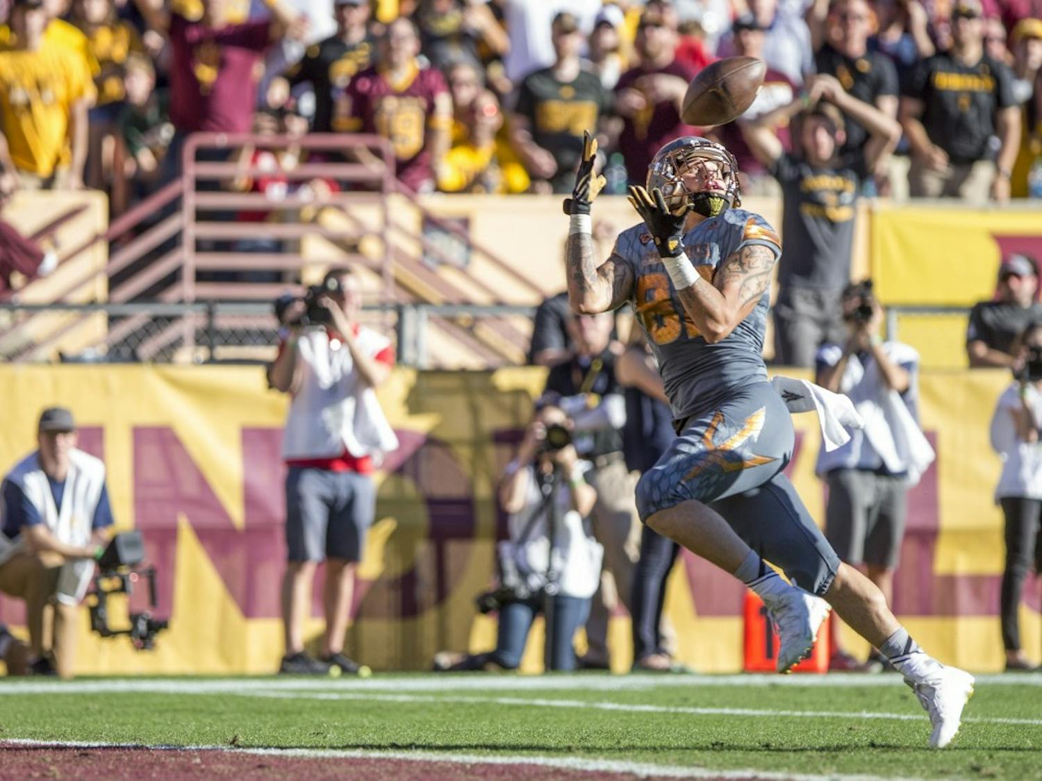 Redshirt freshman wide receiver Jalen Harvey hauls in a long ball for a touchdown in the second half of a game at Sun Devil Stadium in Tempe, Ariz., on Saturday, Nov. 21, 2015. The ASU Sun Devils led the UA Wildcats 31-10 at halftime. 