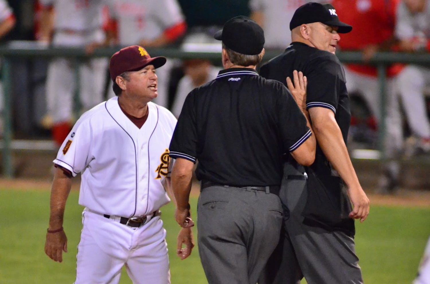 Steady presence: ASU coach Tim Esmay argues with the umpiring crew during the Sun Devils’ 4-2 win over New Mexico on June 3. Esmay’s leadership this past season was a large part of the team’s success. (Photo by Aaron Lavinsky)