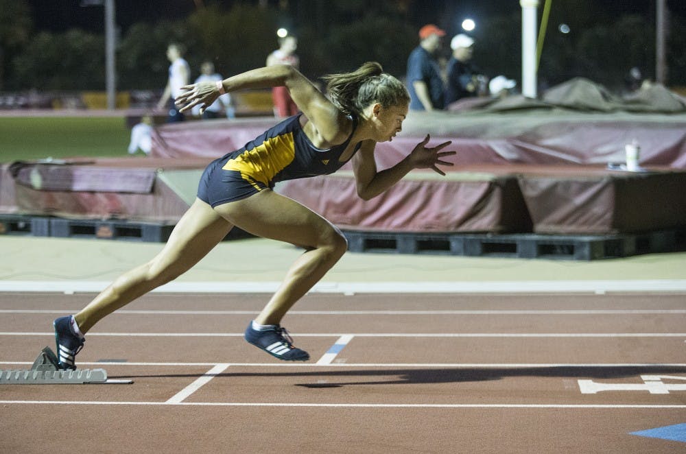 ASU's Sierra Irvin jumps out of the blocks in the 400-meter dash during the second day of the 2016 Pac-12/Big Ten Invitational track meet at Sun Angel Stadium in Tempe, Arizona, on Saturday, March 26, 2016. 