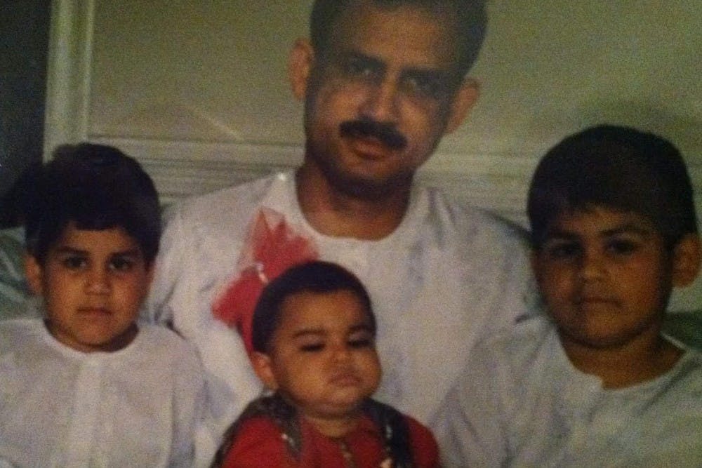 The Shakoor family pose for a photo.