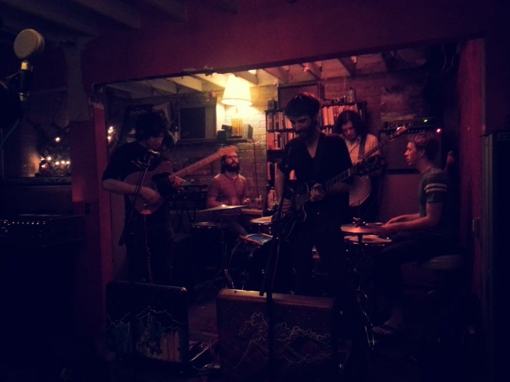 In the dim-lit Dressing Room hugged, Wooden Indian filles the room up with eclectic sounds and cigarette smoke. 
Photo by Noemi Gonzalez