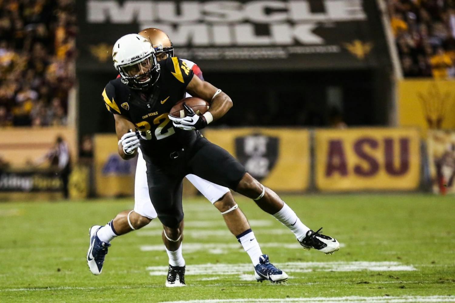 Redshirt senior Kevin Ozier carries the ball up field for ASU. ASU beat UA Nov. 30, 58-21 and will play at home for the championship game Saturday. (Photo by Arianna Grainey)