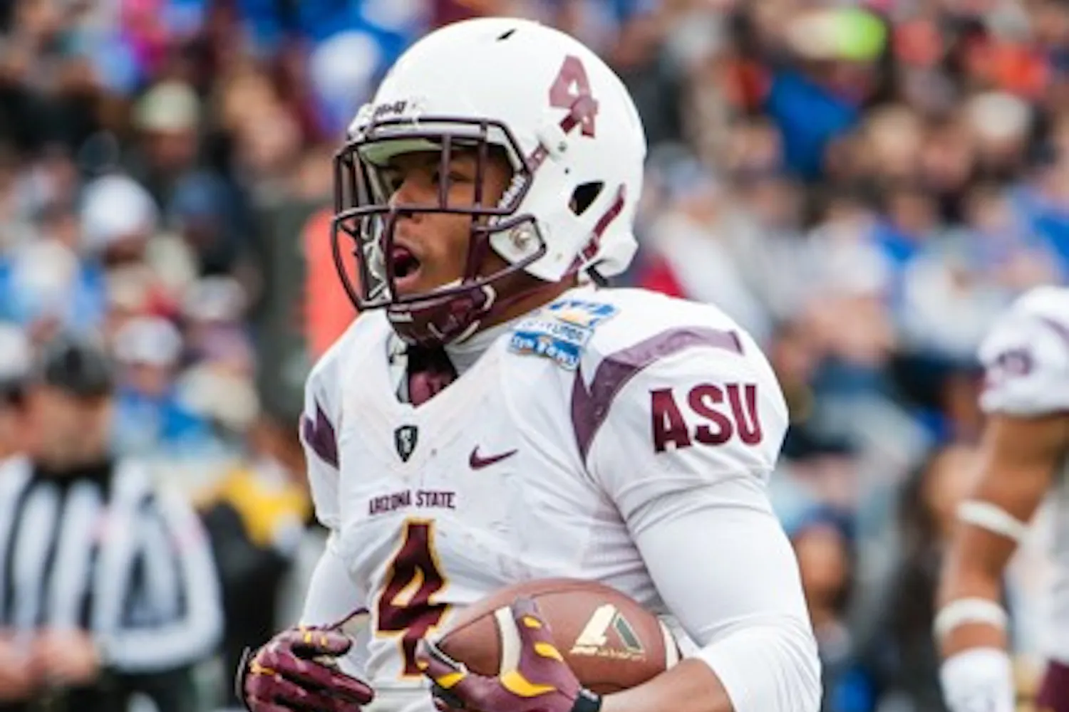 Freshman running back Demario Richard scores a touchdown in the Sun Bowl against Duke, Saturday, Dec. 27, 2014 at Sun Bowl Stadium in El Paso. (Ben Moffat/The State Press)