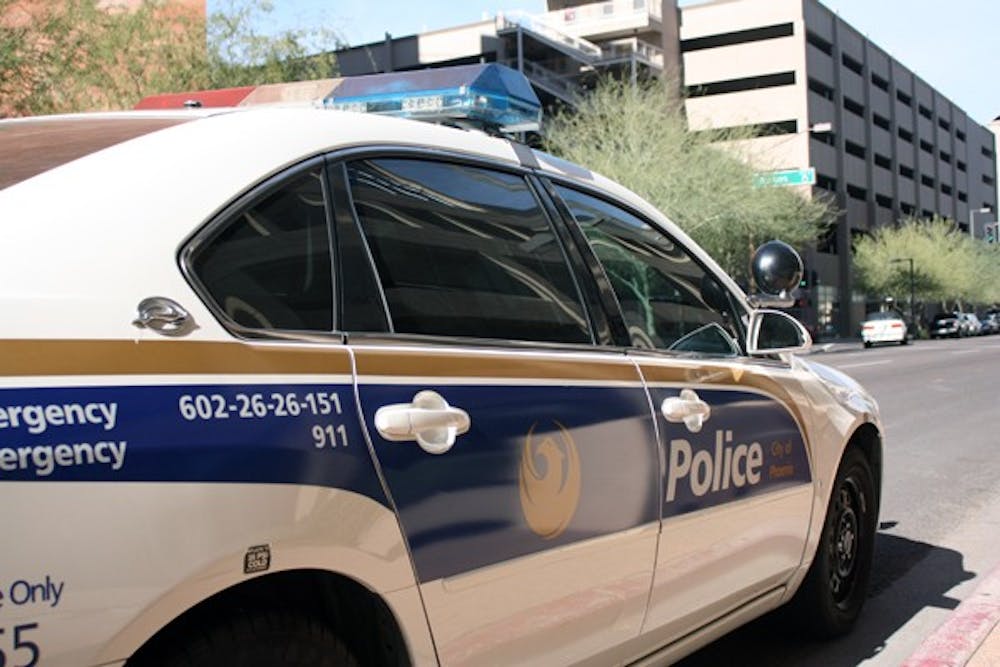 The Phoenix Police Department initiated the 13/20 program on Monday. Officers from the Cactus Park Precinct will experience new shifts hours of three 13-hours days on and four days off. (Photo by Shawn Raymundo)