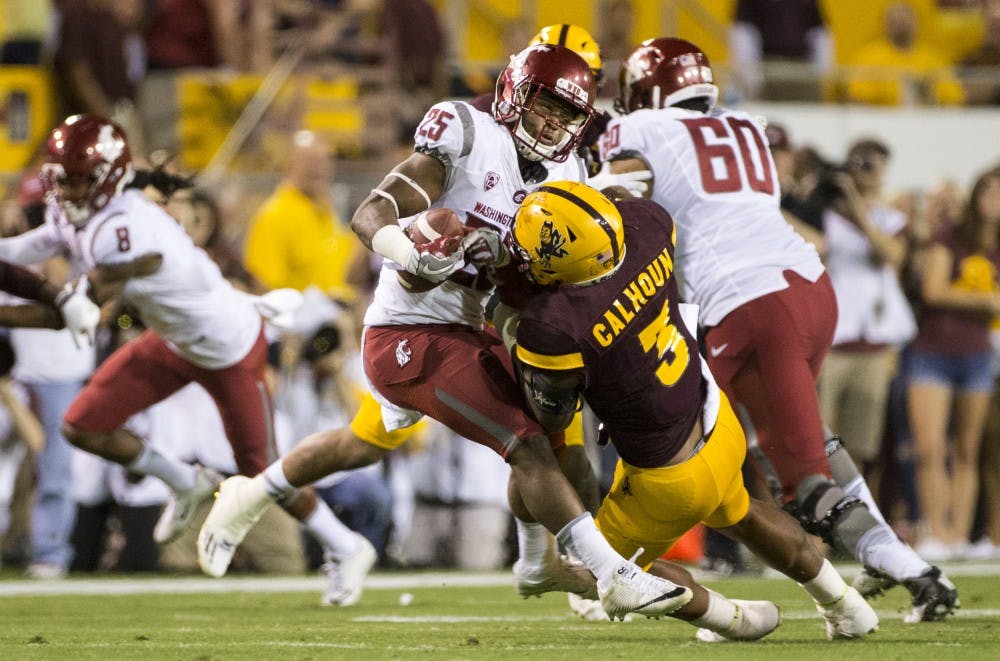 ASU Sun Devils linebacker DJ Calhoun (3) tackles WSU Cougars running back Jamal Morrow (25) during a game against WSU in Sun Devil Stadium, in Tempe, Arizona, on Saturday, Oct. 22, 2016.