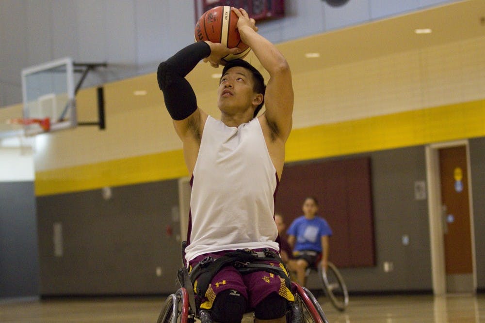 ASU graduate student Donald Santiago takes a shot during practice in the downtown Sun Devil Fitness Center in Phoenix, Arizona, on Friday, Sept. 30, 2016.