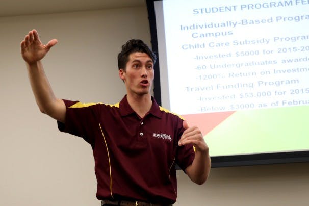 Undergraduate Student Government President Isaac Miller speaks at the town hall about the proposal to raise the athletic on Tuesday, Feb. 23, 2016, in the Memorial Union. 