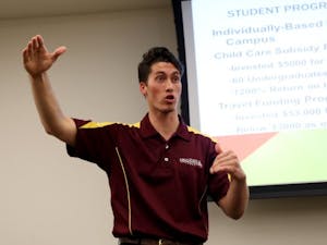 Undergraduate Student Government President Isaac Miller speaks at the town hall about the proposal to raise the athletic on Tuesday, Feb. 23, 2016, in the Memorial Union. 