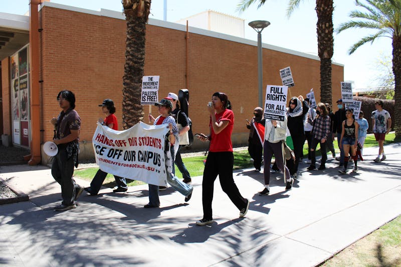 Protesters march across the ASU Tempe campus on Wednesday, April 9, 2025 in Tempe.