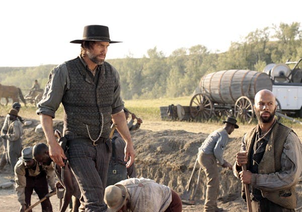 Cullen Bohannon (Anson Mount) and Elam Jefferson (Common) - Hell On Wheels - Season 1, Episode 1 - Photo Credit: Chris Large/AMC - HOW_101_2425