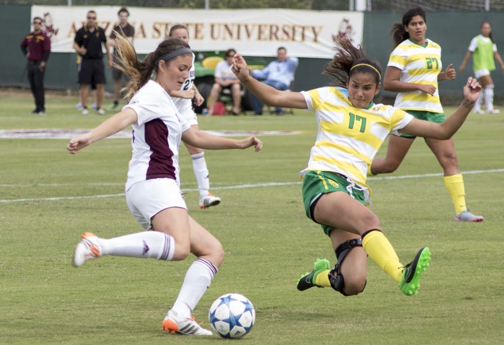 Senior midfielder Whitney Kanavel attempts a shot on goal in the second half against Oregon on Sunday, Oct. 25, 2015, at Sun Devil Soccer Stadium in Tempe. The Sun Devils defeated the Ducks 1-0.
