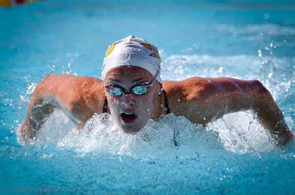 Caroline Kuczynski swims the butterfly in a meet against UA on Feb. 11. Kuczynski and the ASU women’s swim team finished a successful season with their highest finish at the NCAA championships since 2005. (Photo by Aaron Lavinsky)