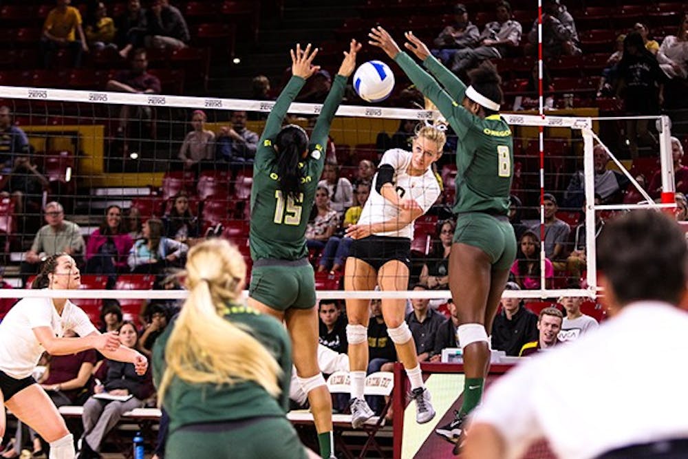Sophomore outside hitter Kizzy Willey watches her shot during the fourth set of the ASU vs Oregon volleyball game at the Wells Fargo Arena on November 11th, 2014. The Sun Devils would win the fourth set 26-24 but lose in five 3-2 to the Ducks. (Photo by Daniel Kwon)