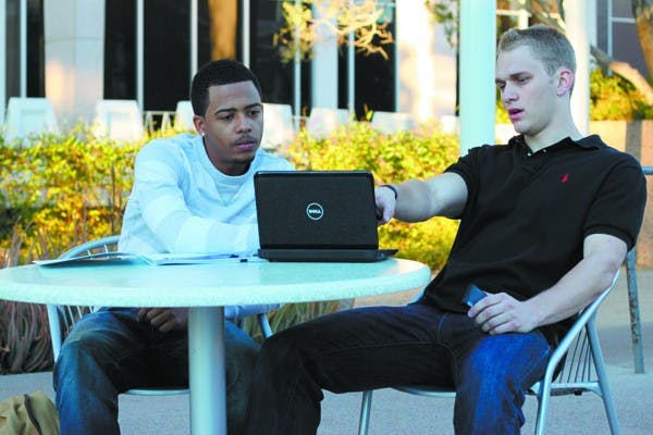 ENTREPRENEURS: Juniors Tyler Hughes (right) and Larry Lynn (left) are the creators of OffCampusReportCard.com, a site that help students review off-campus housing.  (Photo by Rosie Gochnour)