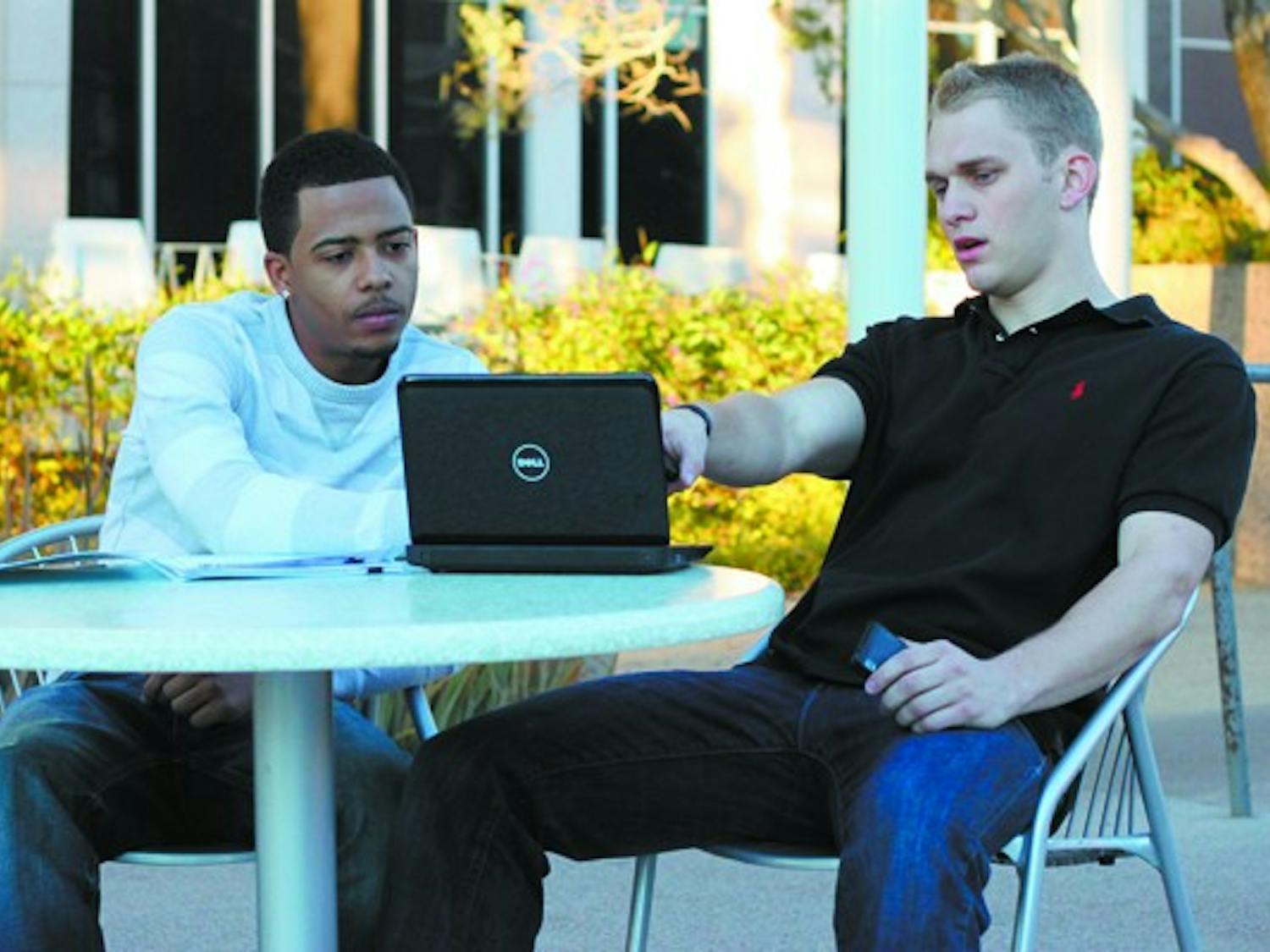 ENTREPRENEURS: Juniors Tyler Hughes (right) and Larry Lynn (left) are the creators of OffCampusReportCard.com, a site that help students review off-campus housing.  (Photo by Rosie Gochnour)