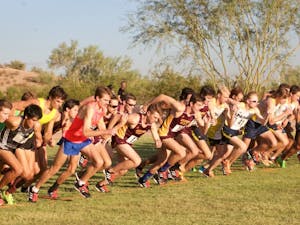 Men's cross country competitors take their first steps at the starting line at the ASU cross country invitational on Friday, Oct. 23, 2015, in Papago Golf Course in Phoenix.