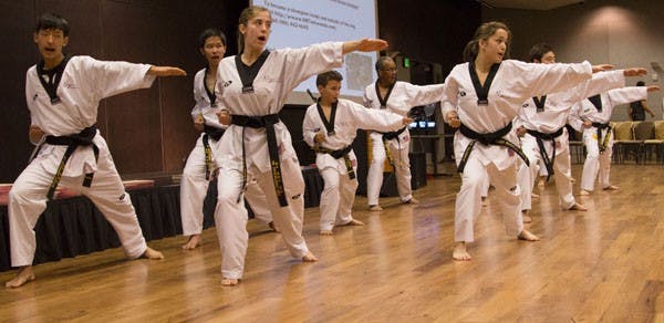 On Friday more than 350 people went to the Tempe campus to watch  taekwondo performances and videos and some even participated in a few competitions as part of the Asian/Asian Pacific American Students Coalition’s annual culture night, CultureTube. NB Taekwondo representatives entertained the crowd by showing off their skills of breaking wood, dancing and other talents. (Photo by Ana Ramiez)
