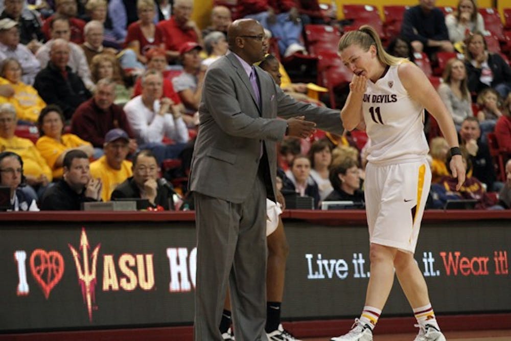 Kali Bennett walks off the court with a bloody nose in a game against Stanford on Thursday night. The Sun Devils lost 62–49 to the No. 4 Cardinal. (Photo by Sam Rosenbaum)