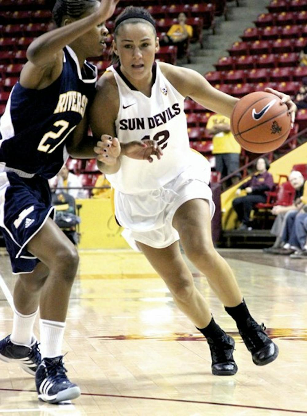 ASU guard Alex Earl tries to get past UC Riverside junior guard Briauna Linton during the Sun Devils’ 66-46 win over the Highlanders. The Sun Devils travel to Puerto Rico on Thanksgiving weekend for the San Juan Shootout, where they will face Illinois and Rutgers. (Photo by Sam Rosenbaum)