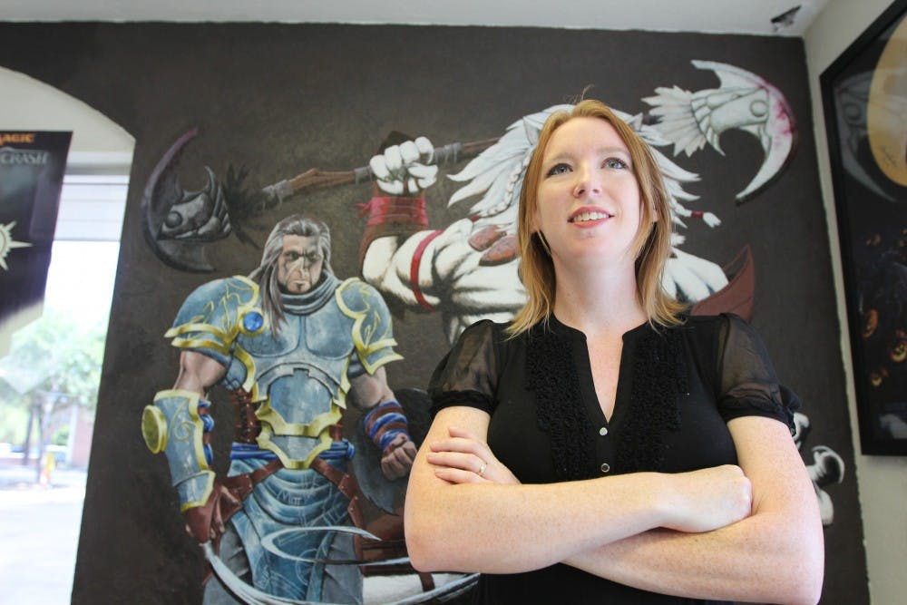 Ashley Busch is an ASU Graduate student studying Archeology, but her student costs have become increasingly too hard to handle. With a baby on the way, her and her husband have had to turn to the government for help. (photo by Dominic Valente)