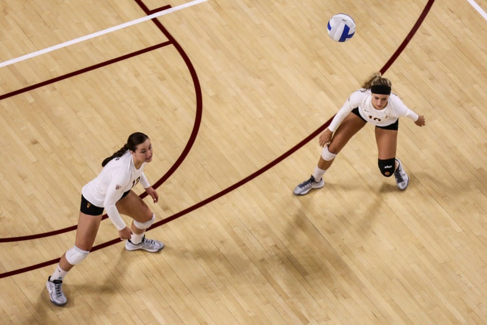 Sophomore outside hitter Macey Gardner and freshman outside hitter McKenzie Willey prepare for the ball during a match. The Sun Devils play Colorado on Thursday and Utah on Sunday in their last two home games. (Photo by Arianna Grainey)