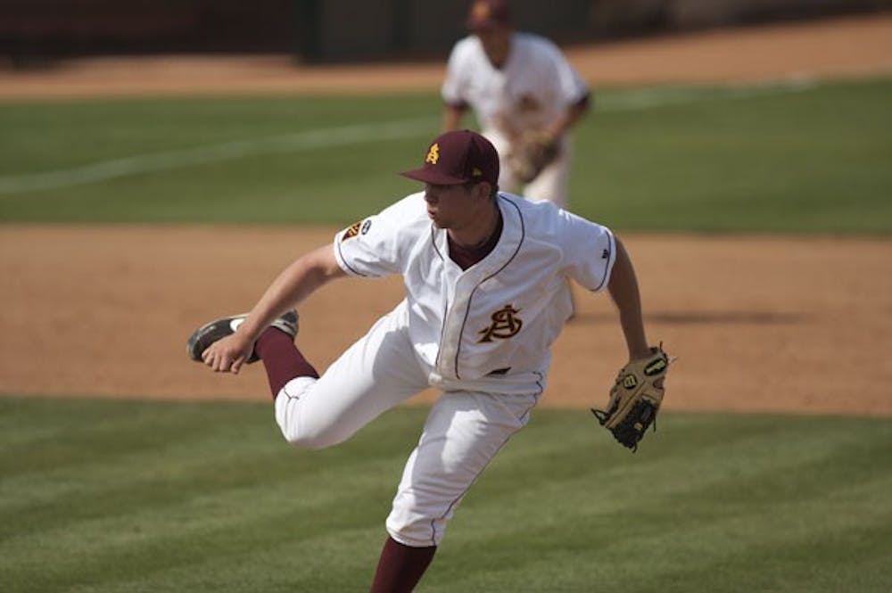 ROAD WARRIORS: Freshman Jake Barrett throws a pitch during the Sun Devils’ 6-5 win over Houston last month. The Sun Devils are in Eugene tonight to face Oregon in their first Pac-10 road series.(Photo by Scott Stuk)