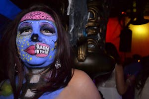 A zombie is not camera shy during the Zombie Ball event at Club Palazzo in Phoenix, Arizona on October 16, 2015.