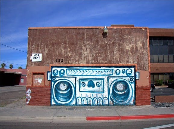 URBAN ART: A banner of a radio, painted by local artist Lalo Cota, is seen in Central Phoenix on Roosevelt and 3rd Street. (Photo courtesy of Phoenix Taco)