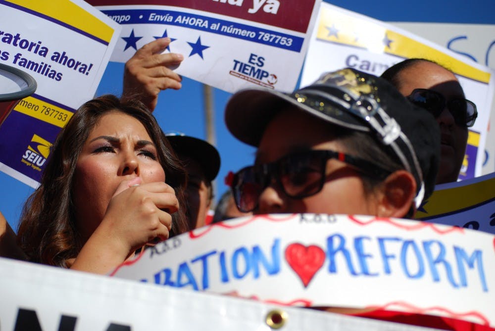 Hundreds gathered to march through Phoenix to bring awareness to the on going issues of immigrants on October, 5, 2013. The "March for dignity and respect" featured speeches by organizers, faith-leaders, politicians and community members. (Photo by Murphy Bannerman)
