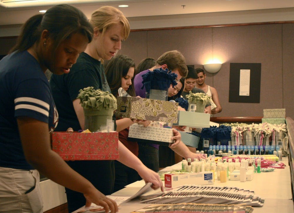 On Saturday April 27th, ASU students helped put together care packages for families of premature babies who are in the hospital waiting for the day they can take their new born home. Tempe City Councilman Kolby Granvile was one of the many participants in the event. (Photo by Hector Salas Almedia)