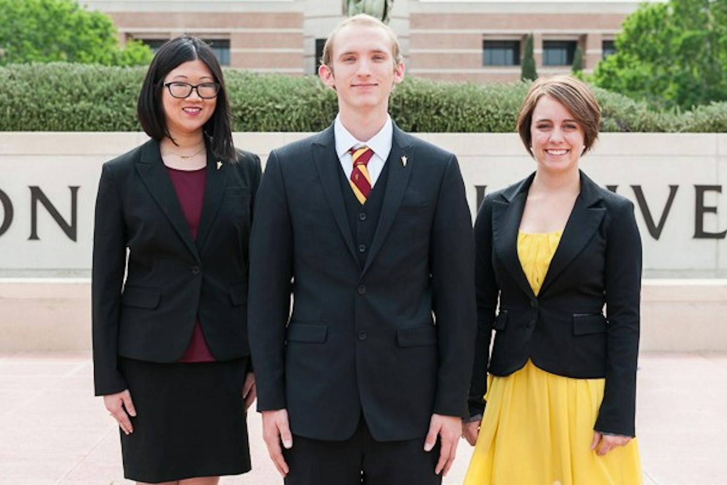 Vice President of Policy candidate Dakota Larson (left), presidential candidate Brandon Olson and Vice President of Services candidate Meghan Dingman pose for a portrait on Wednesday, March 18, 2015 on the West campus. The three are running together as one executive ticket in this year's USG West election. (Ben Moffat/The State Press)