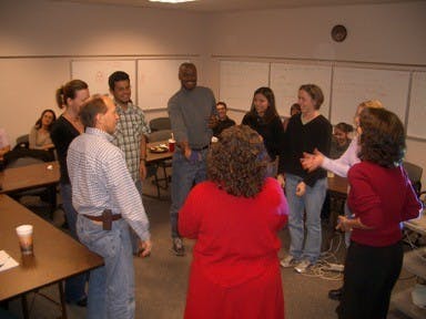 Community group leaders involved in the Bridges to High School program prepare to work with middle schoolers and their families. (Photo Courtesy of Nancy Gonzales)