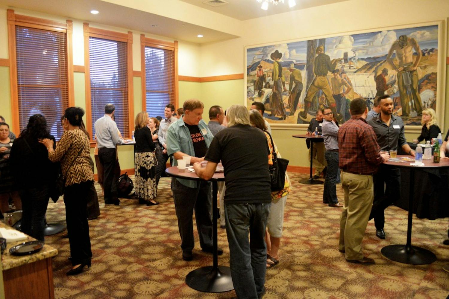 LGBT Devils Pride members gather for a Memory and Identity Workshop featuring Rigoberto González on Wednesday at Old Main in Tempe. Rigoberto González is an ASU alumnus and was most recently awarded the Lenore Marshall Poetry Prize and the Lambda Literary Award for his 2013 book “Unpeopled Eden.” (Krista Tillman/ The State Press).