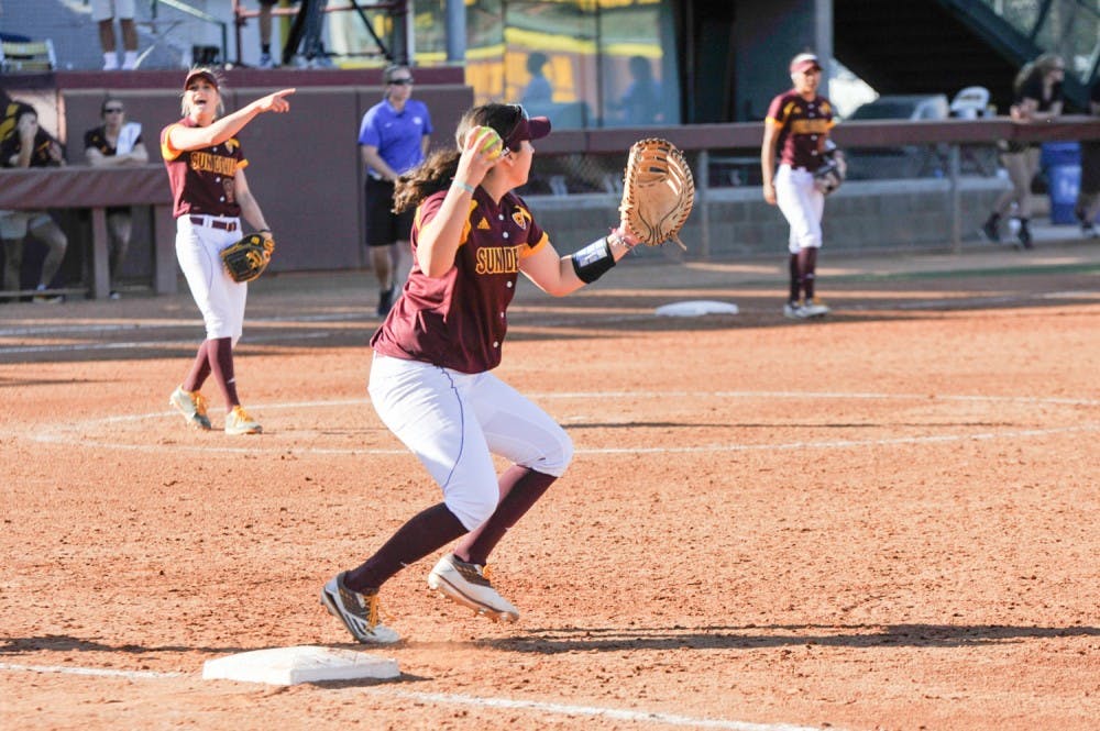 Sophomore infielder Margaret Stahm throws to second after making the out at first in a game against the University of Kentucky on Monday, Feb. 15, 2016,  at Farrington Stadium in Tempe, AZ.