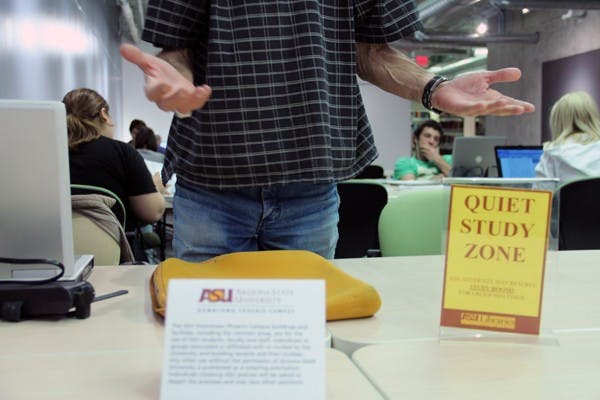 A man is asked to leave the University Center library on the Downtown campus Tuesday afternoon. ASU is cracking down on the removal of non-ASU affiliated people on campus and in common areas. (Photo by Thania A. Betancourt)