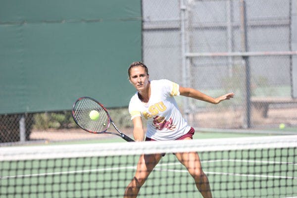 Freshman Stephanie Vlad returns a ball during an ASU tennis practice on Sept. 19 prior to the Michigan Invitational. (Photo by Kyle Newman)