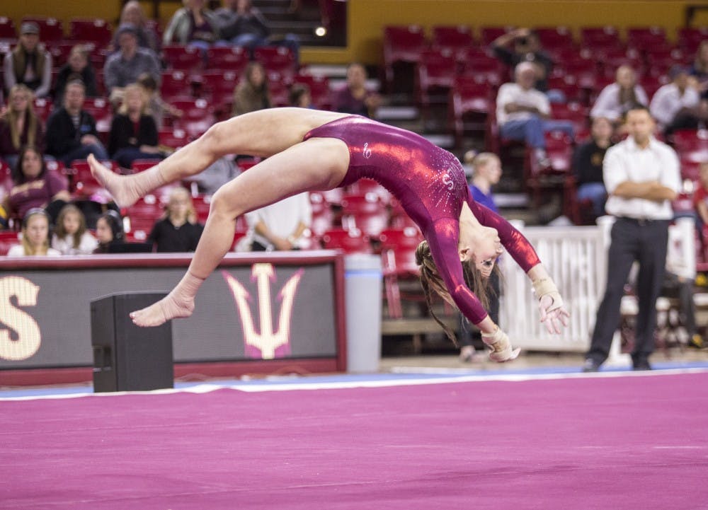 Katelyn Lentz performs her floor routine during a gymnastics meet against the University of Washington Huskies at Wells Fargo Arena in Tempe, Ariz., on Monday, Jan. 18, 2015. The Huskies posted a 194.650-192.450 victory over the Sun Devils.