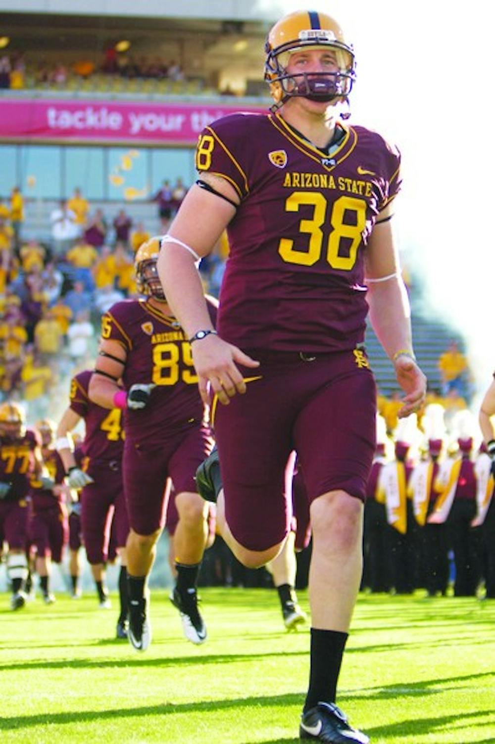 BIG BOOT: Redshirt senior punter Trevor Hankins takes the field earlier this season. Hankins 45.5 yards per punt average is currently third in the Pac-10 Conference and 10th  in the nation. (Photo by Scott Stuk)