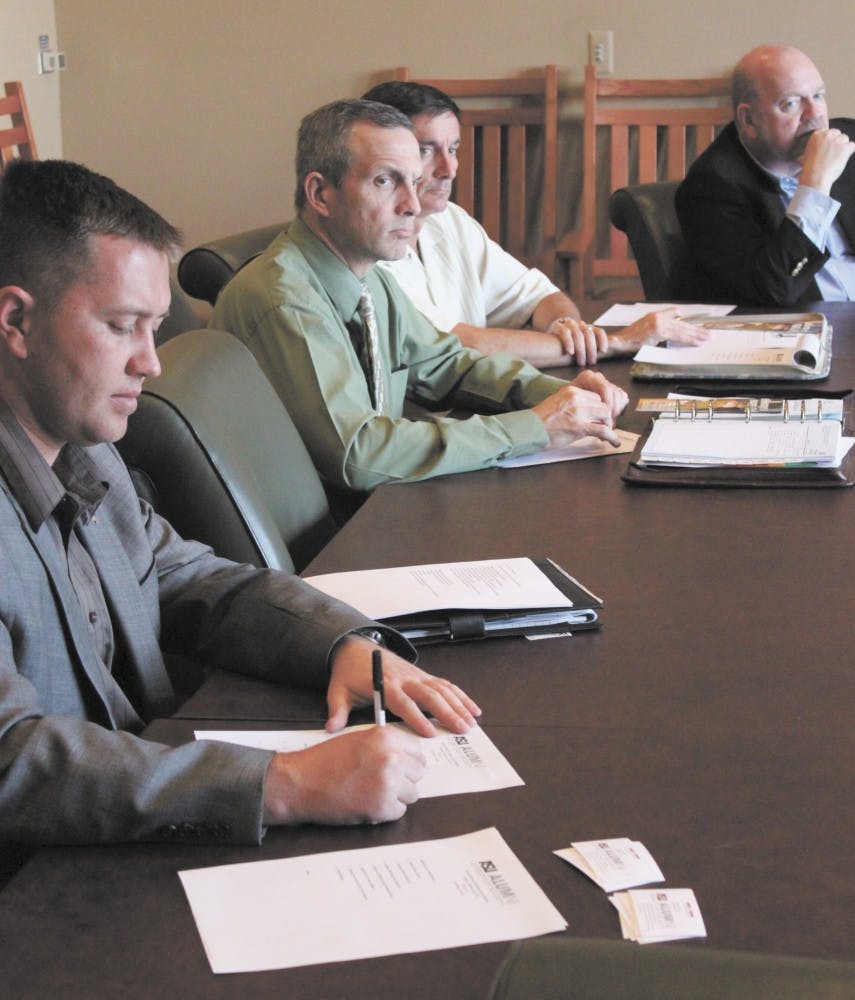 VET NOMINEES: Pictured from left to right, Corey Harris, Chris Rauschenbach, Jason Smith and Art O'Hagan listen to nominations for board members in the new ASU Alumni Association Veterans Chapter on Tuesday in Tempe. (Photo by Beth Easterbrook)