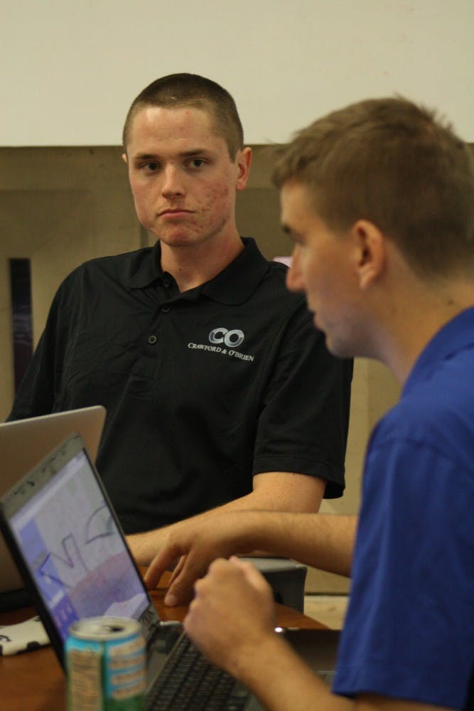 Finance junior Charles Crawford and Michael O'brien started mappedphoenix.com, a crowd-sourced web app for events, restaurants, tourist sports and hidden treasures around the valley. The web app was launched last week. (Photo by Hector Salas Almeida)