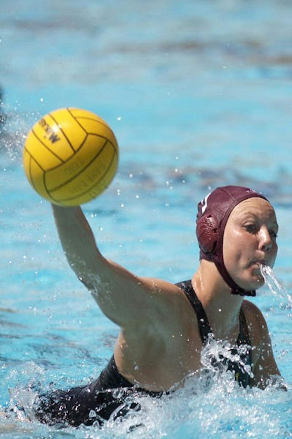 LAST HOORAH: ASU freshman center Shannon Haas gets ready to pass during the Sun Devils' 14-5 loss to USC last weekend at the Mona Plummer Aquatic Center. ASU will face San Diego State and Indiana in its final regular-season home games this weekend. (Photo by Scott Stuk)