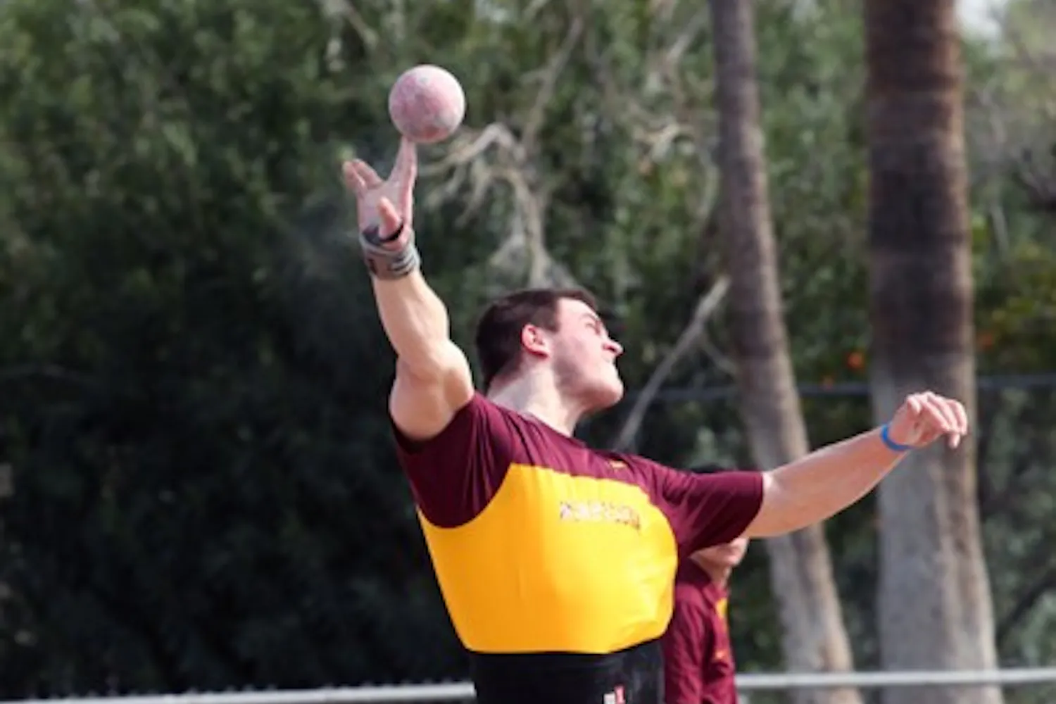 Jordan Clarke throws the shot put at the Baldy Castillo Invite on Mar. 19, 2011. Clarke looks to build upon his early season success at the Texas A&M Mondo Challenge this weekend. (Photo by Beth Easterbrook)